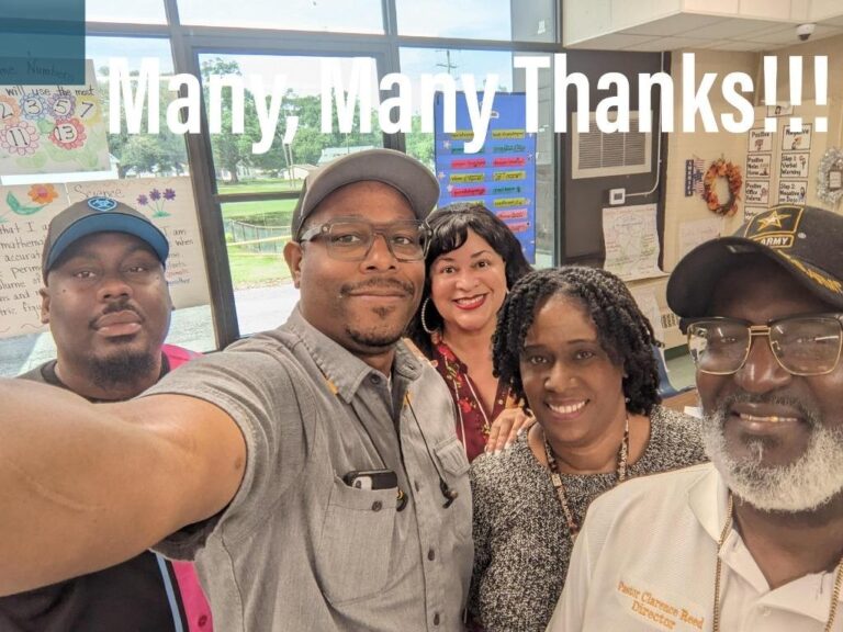 Clarence Reed with staff and faculty